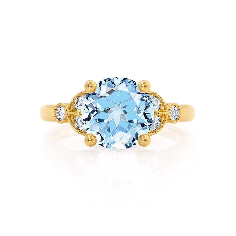 DELILAH - Chatham® Round Aqua Spinel 18k Yellow Gold Shoulder Set Ring