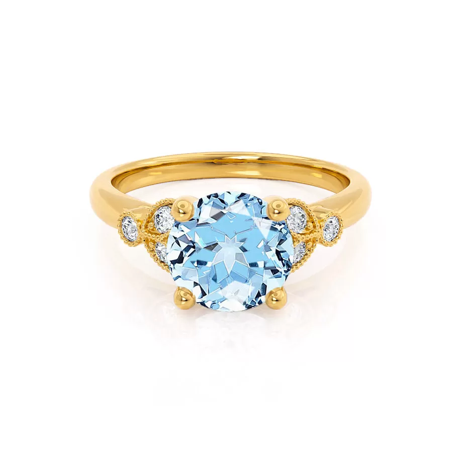 DELILAH - Chatham® Round Aqua Spinel 18k Yellow Gold Shoulder Set Ring